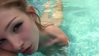 Watch A Beautiful Girl Masturbate In The Pool