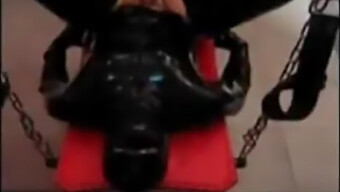 Latex Slave Takes It Hard With A Strapon