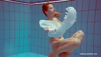 Big-Boobbed Beauty Gets Naughty In The Pool